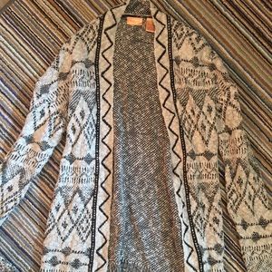 Bret with black cardigan